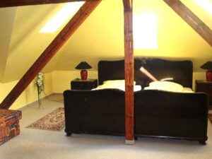 Ferienwohnung Villa Panther in Ehrenfriedersdorf, Dachgeschoss: Zimmer unter dem Dach